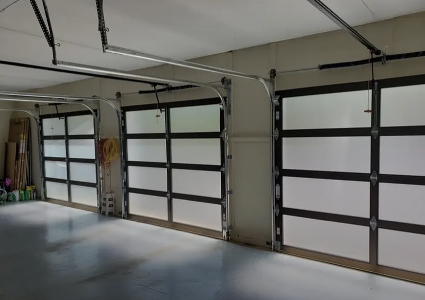 3 white and dark brown Garage Door Opener
