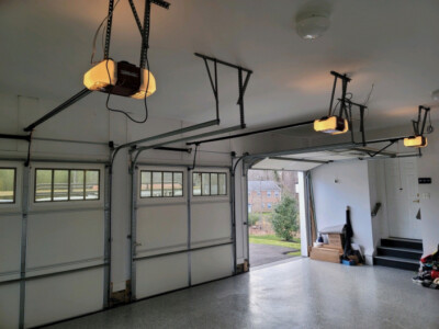 Overhead mounts and openers installed in garage by American Joe Garage